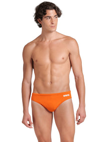 Arena Men's Solid Brief Swimsuit Team Orange