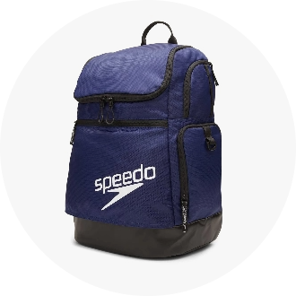 Navy blue swim backpack with multiple zippered compartments and a black base. Features the "Speedo" logo prominently displayed on the front. Ideal for carrying swim gear and accessories.